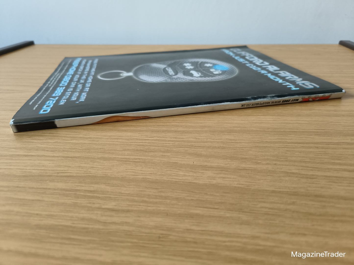 Book on a wooden surface with a blurred background